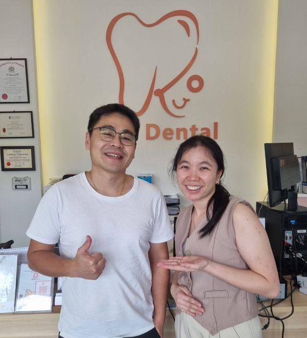 Dental implant happy patient in Kuo Dental