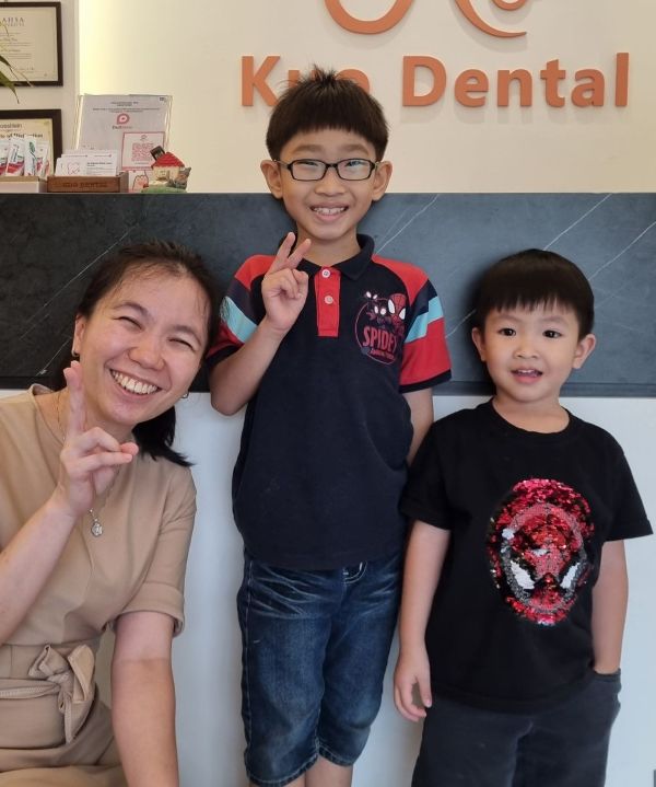 Dentist with happy kids.